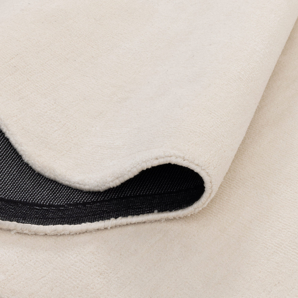 Ollie Scalloped Irregular Round Rug Ivory
